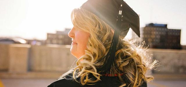 Woman at university graduation.